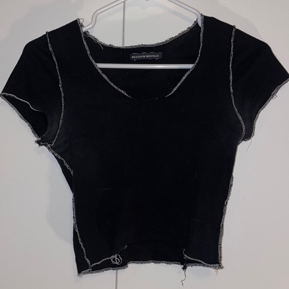 Black short sleeve shirt with white stitching